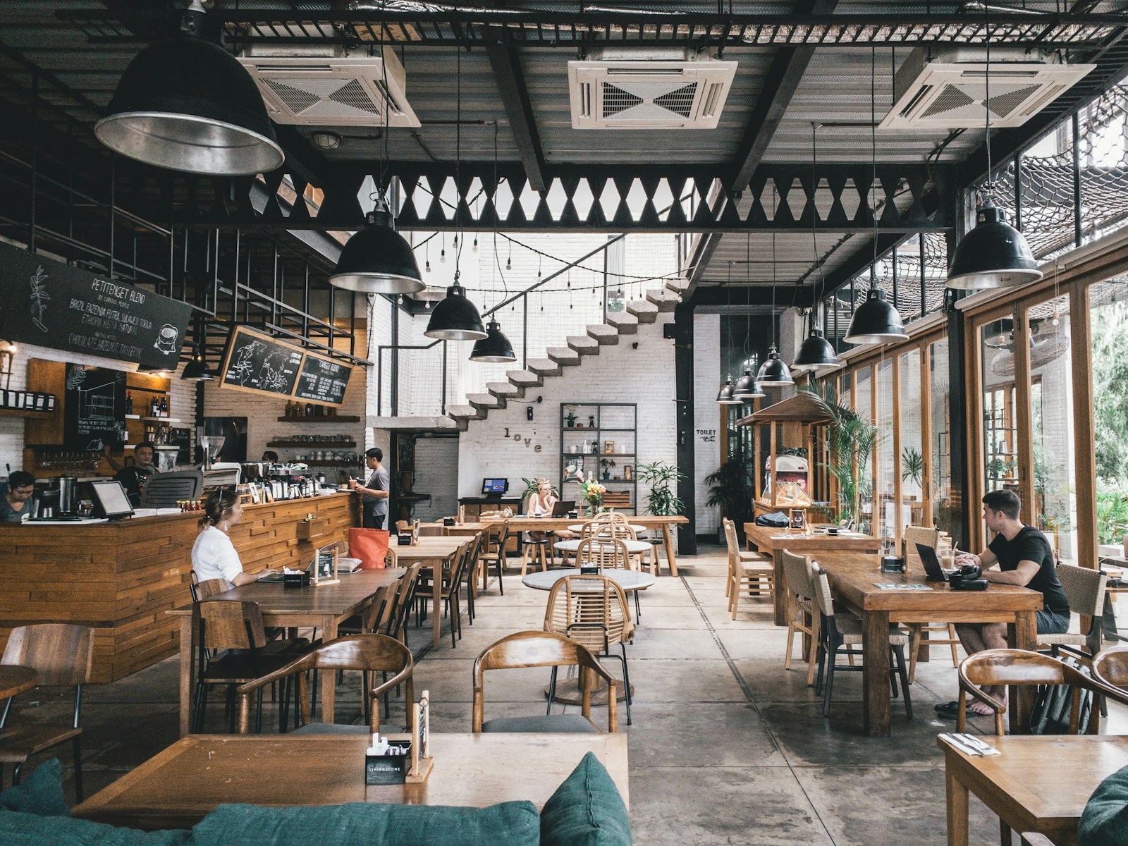 A warmly lit restaurant dining room